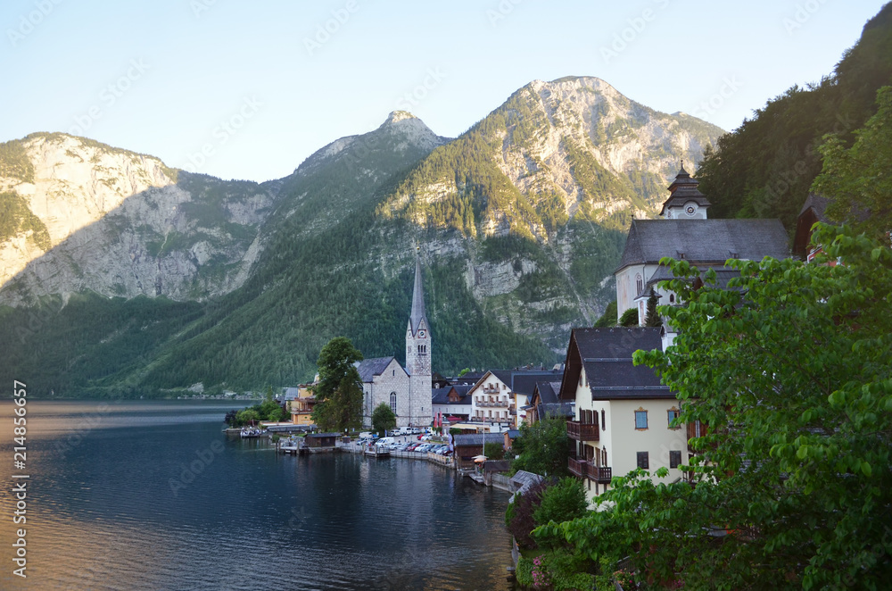 Picturesque view of small resort town near mountains on riverside