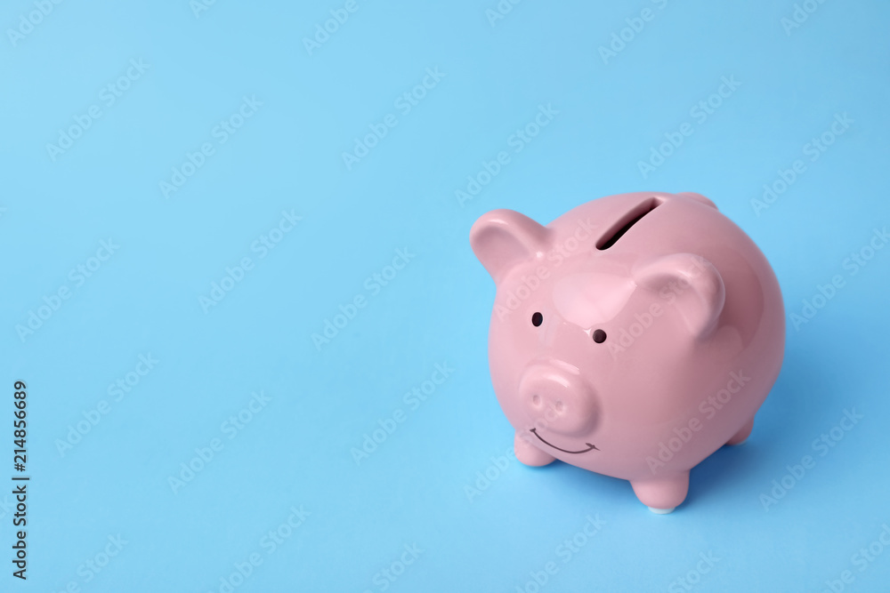 Pink piggy bank on color background. Money saving Pink piggy bank on color background. Money saving