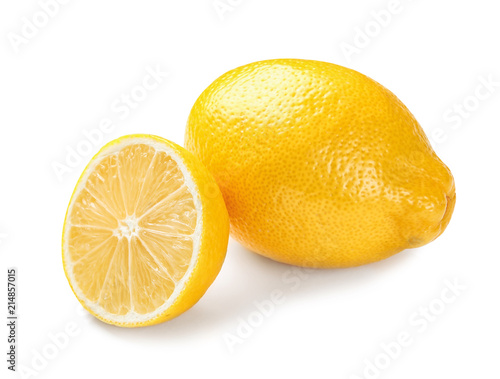 Ripe whole and sliced lemons on white background