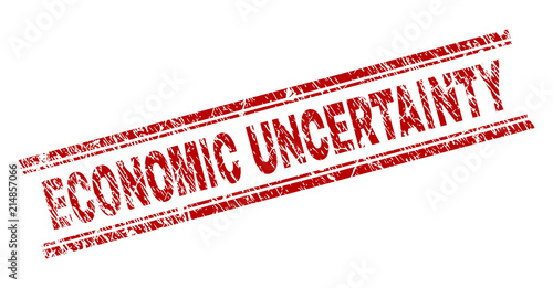 ECONOMIC UNCERTAINTY seal print with corroded texture. Red vector rubber print of ECONOMIC UNCERTAINTY text with dust texture. Text caption is placed between double parallel lines.