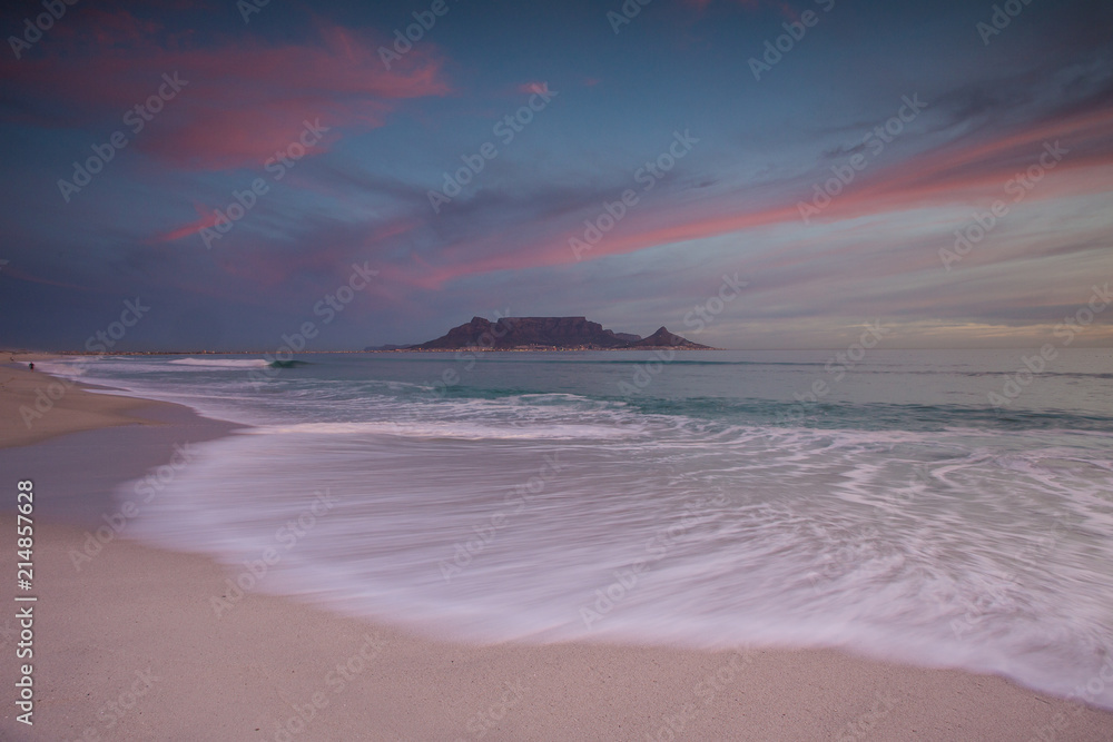 Fototapeta premium Stunning clouds over Table Mountain in Cape Town South Africa,as seen from blouberg beach, one of the top holiday destinations in the world