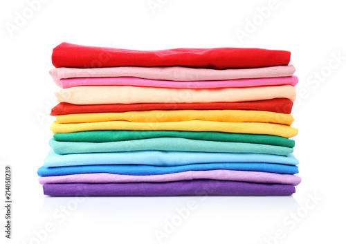 Stack of colorful t-shirts on white background © New Africa