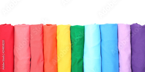 Colorful collection of t-shirts on white background
