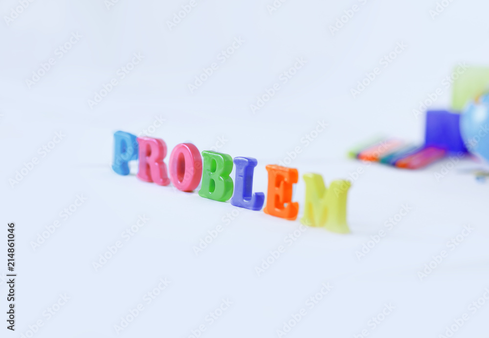 words problem on blurred background of school supplies .photo with copy space words problem on blurred background of school supplies .photo with copy space