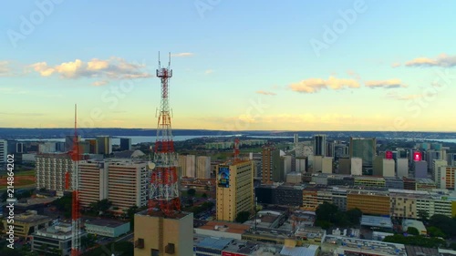 Beautiful aerial sunset view of the city of Brasilia at dusk with the lake in the background photo