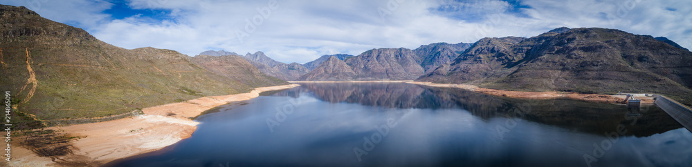 Aerial view over the Bergriver dam in the Bergriver outside Franschhoek in the western cape during the worst drought in decades in South Africa