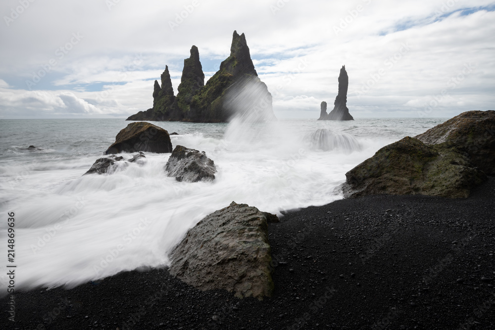 Basalt rock formations Troll toes on black beach. Reynisdrangar, Vik, Iceland