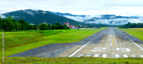 Airport runway with mountain in countryside