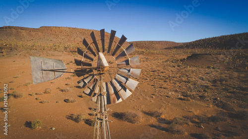 Aerial image over an old windmill / windpump / windpomp in the karoo region of south africa photo