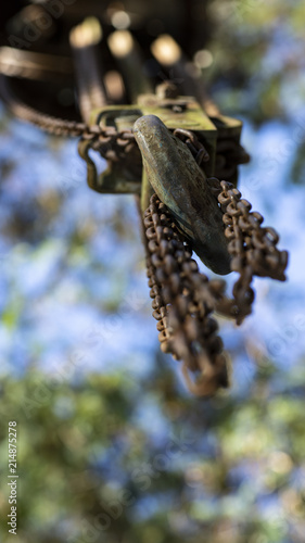 Chains attached to a hook and blurred background