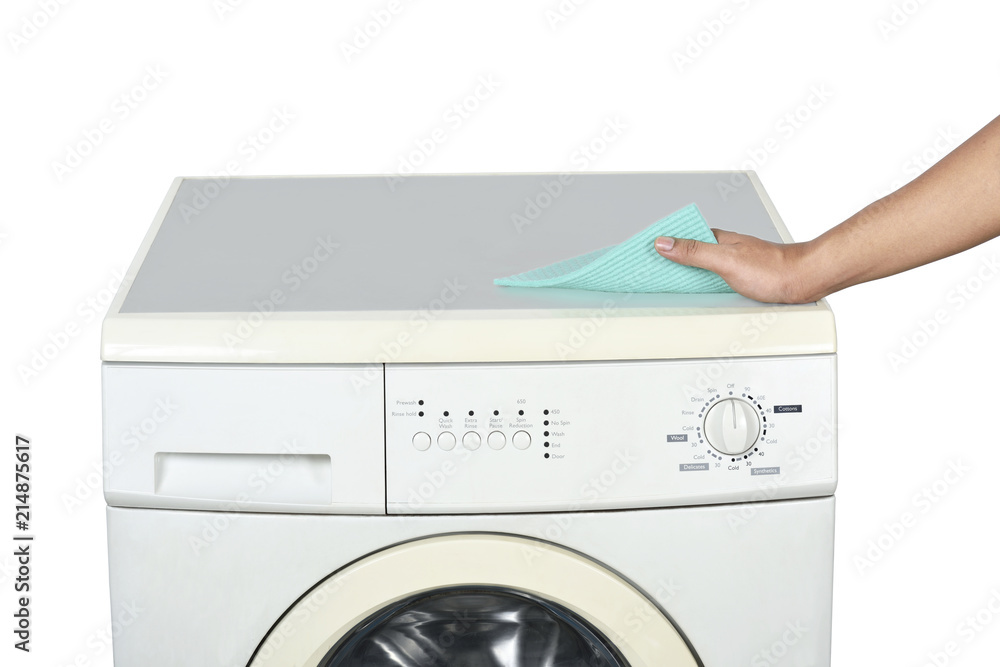 Hands cleaning the washing machine with a washcloth Hands cleaning the washing machine with a washcloth