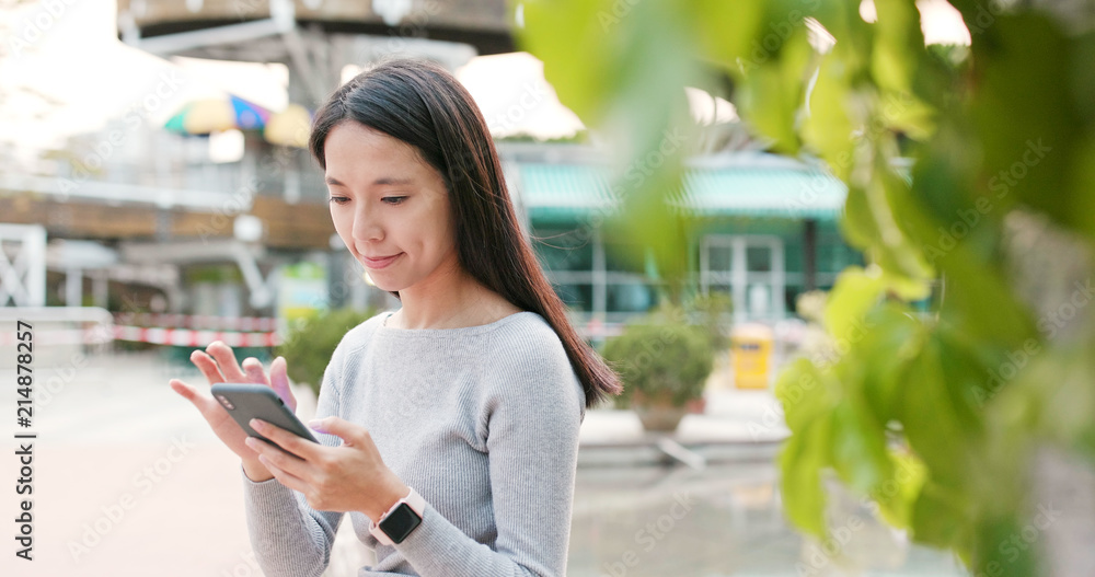 custom made wallpaper toronto digitalWoman use of smart phone in the city at outdoor