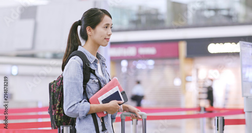 Photography Woman using wait at the line in the airport