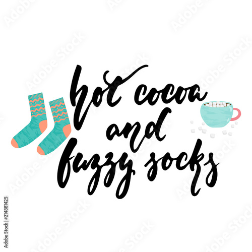 Hot cocoa and fuzzy socks - hand drawn cozy Autumn and Winter lettering and Hugge doodles with cup, marshmallow and warm socks isolated white background. Fun ink vector illustration for cards design.
