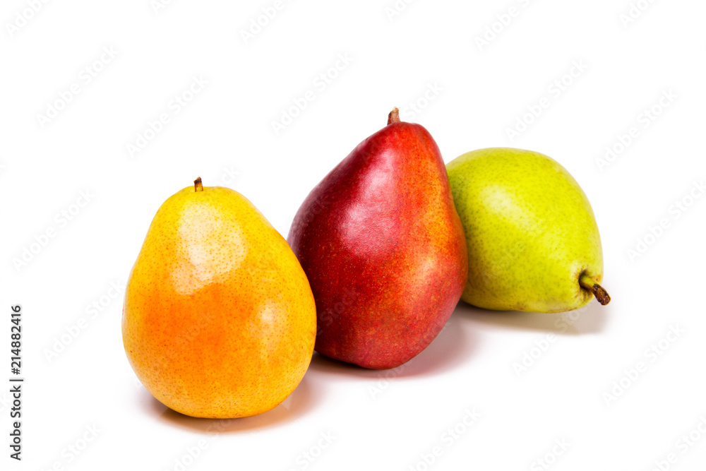 Healthy organic snacks on a white background with text space. Yellow green red pears. Healthy organic snacks on a white background with text space. Yellow green red pears.