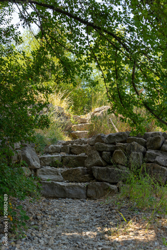 Very stony and rocky hiking trail from the "Cirque des Gens" plateau through forest and undergrowth down to the Ardeche" in the department Ardeche near the village Chauzon © PhotoArt Thomas Klee
