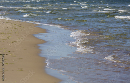 Fototapeta Naklejka Na Ścianę i Meble -  View on beach, wet sand and sea water , seascape.
