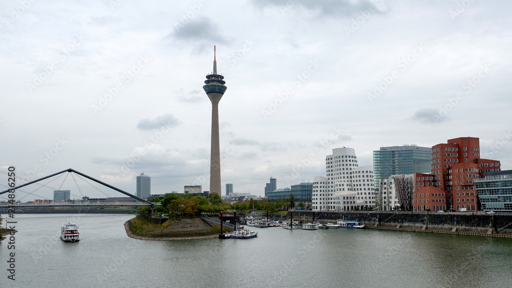 City landscape with a river and a bridge. Dusseldorf, Germany