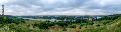Panorama with the river and city buildings on the horizon. Kolomenskoye, Moscow, Russia
