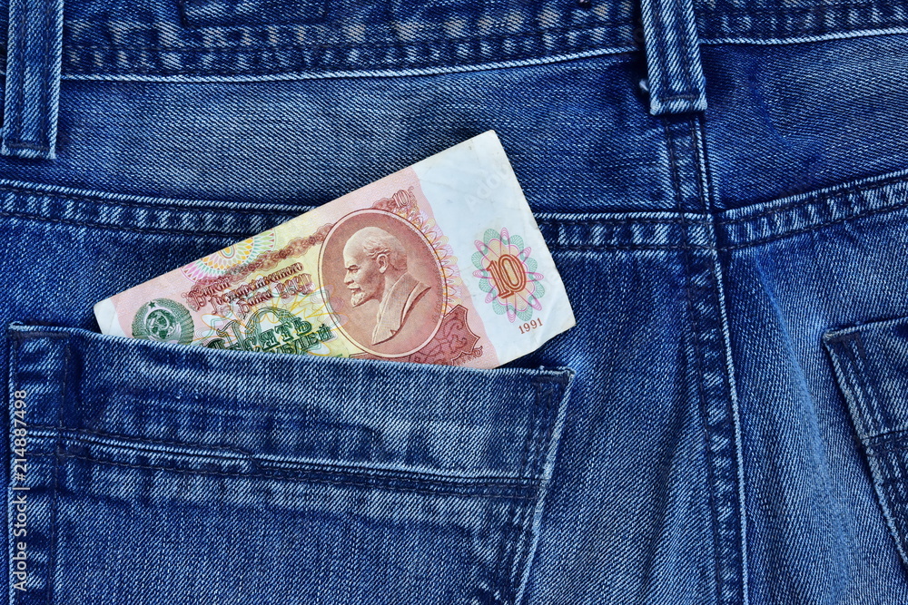 Soviet banknotes of rubles with Lenin's portraits in the back pocket of jeans Soviet banknotes of rubles with Lenin's portraits in the back pocket of jeans