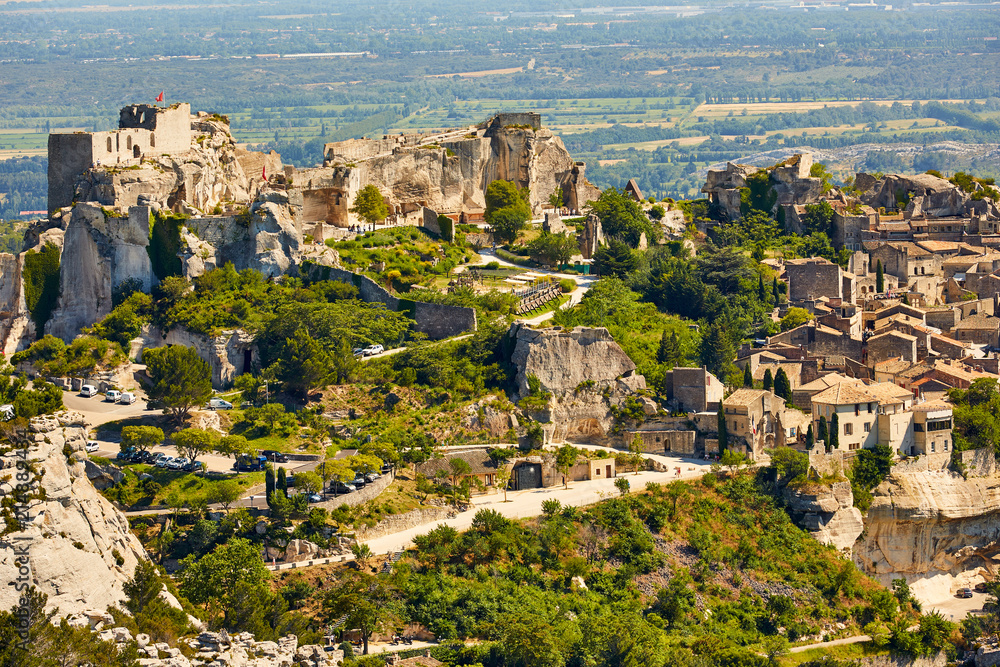 Provencal village Les Baux de Provence and view of Sarragan  stones