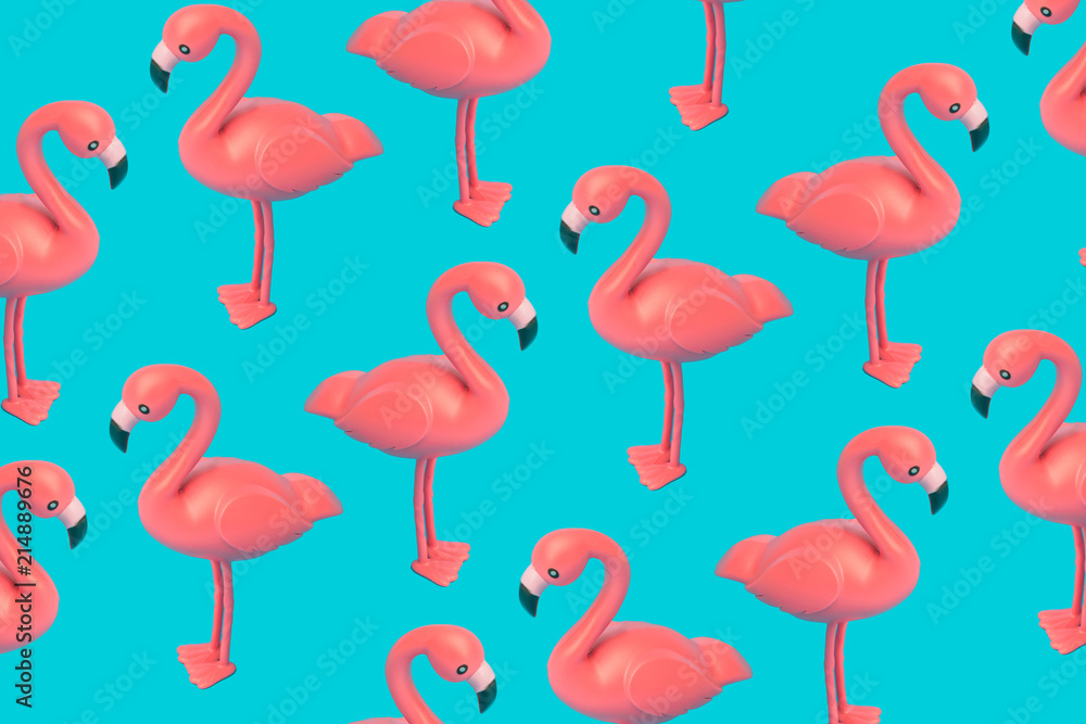 Fototapeta premium Creative pink flamingo pattern on blue background. Abstract art background. Minimal summer concept.