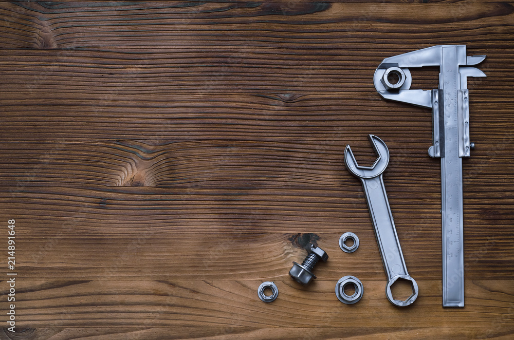 Construction background. Wrench and wood units. Bonding building elements. Construction background. Wrench and wood units. Bonding building elements.