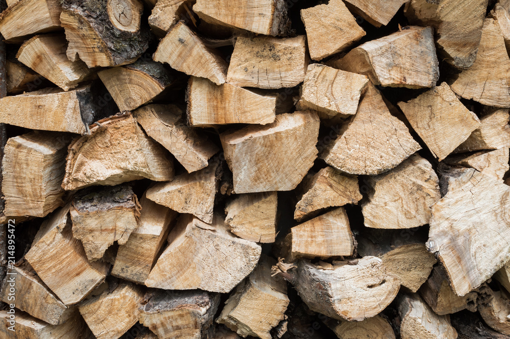 A wall of the knees is a firewood background A wall of the knees is a firewood background