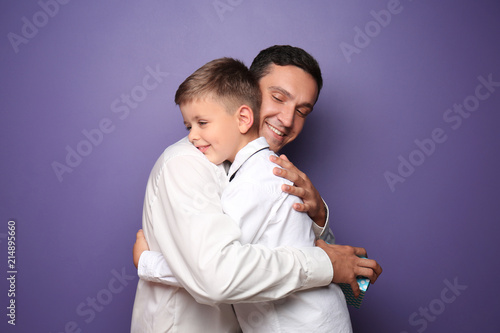 Little boy hugging and gree...