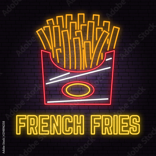 Retro neon french fries sign on brick wall background. Design for cafe, hotel, restaurant or motel.