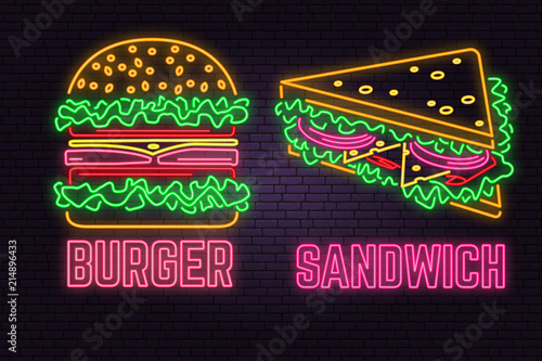 Retro neon burger and sandwich sign on brick wall background. Design for fast food cafe.