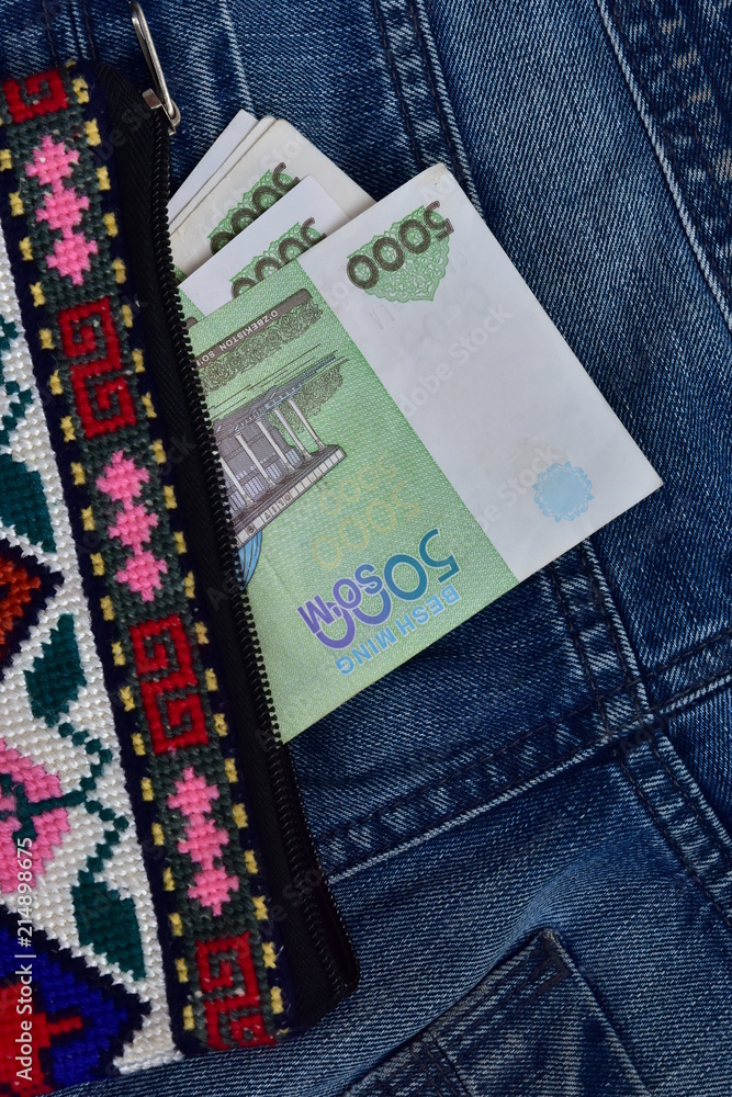 Uzbek national money in a nice clutch purse Uzbek national money in a nice clutch purse