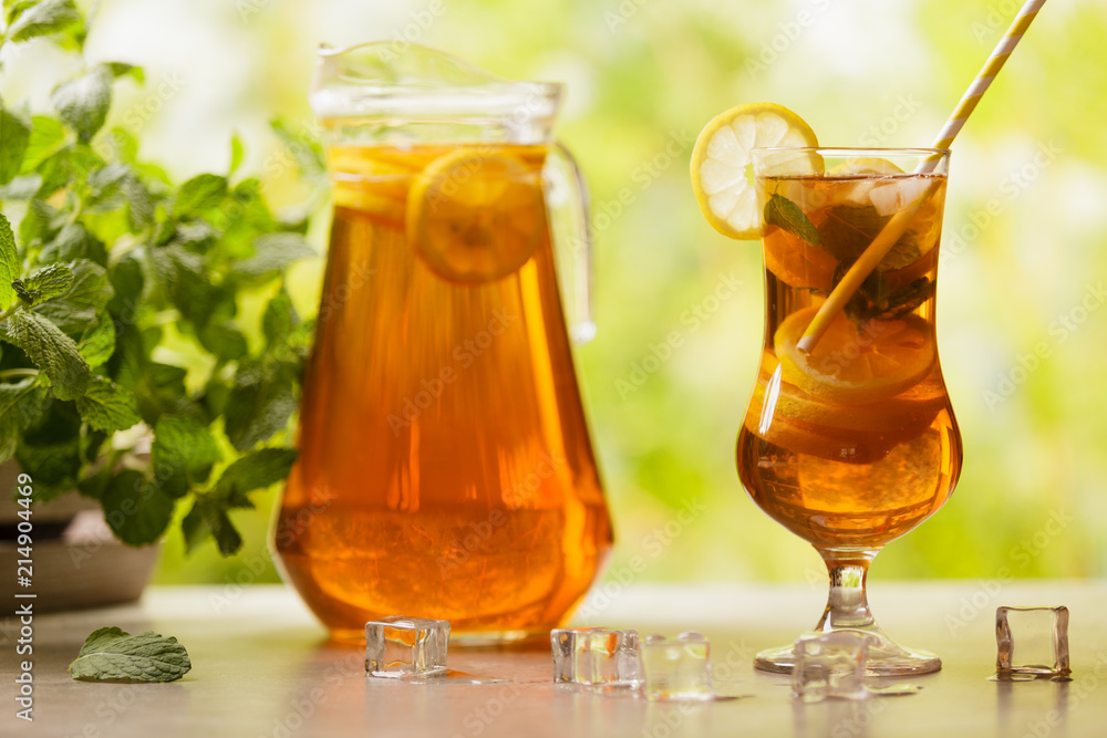 Iced tea with lemon and ice cubes Iced tea with lemon and ice cubes