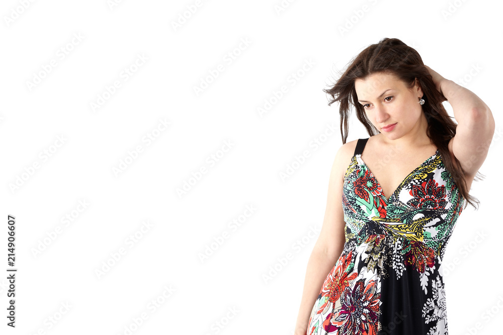 young beautiful woman in sundress with colorful flower pattern young beautiful woman in sundress with colorful flower pattern