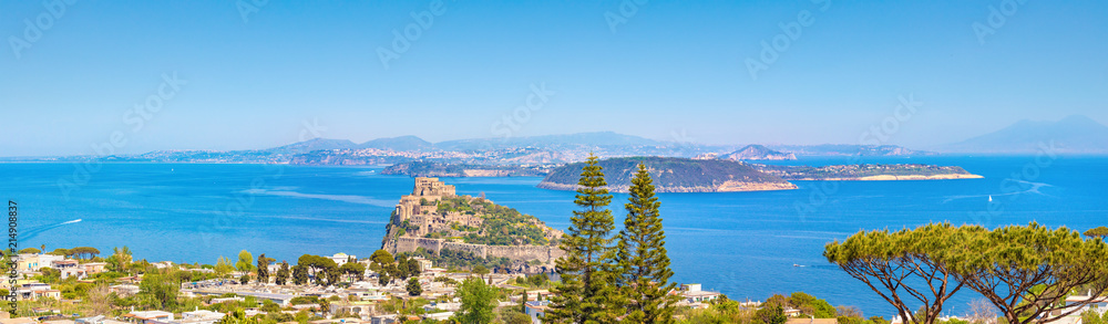 Panoramic view of Gulf of Naples and Ischia Island with Aragonese Castle or Castello Aragonese