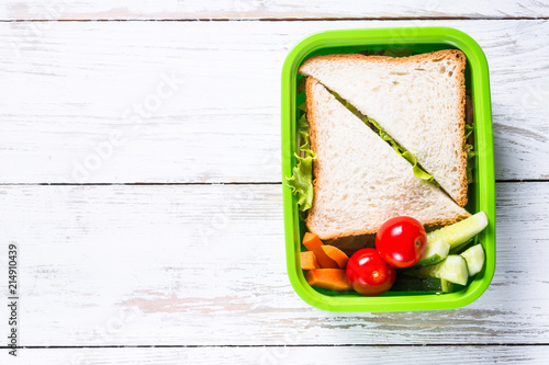 Εκτύπωση καμβά Lunch box with sandwich and vegetables.