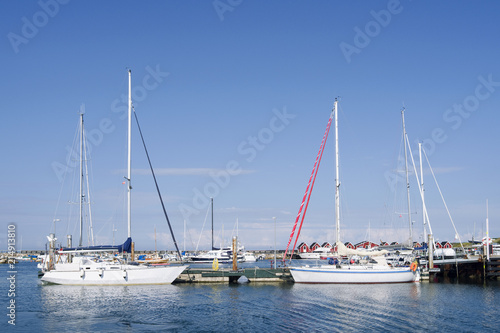 Laesoe / Denmark:  Sailing boats in the small marina of Vesteroe Havn on Laesoe island on a beautiful Sunday morning in the off-season