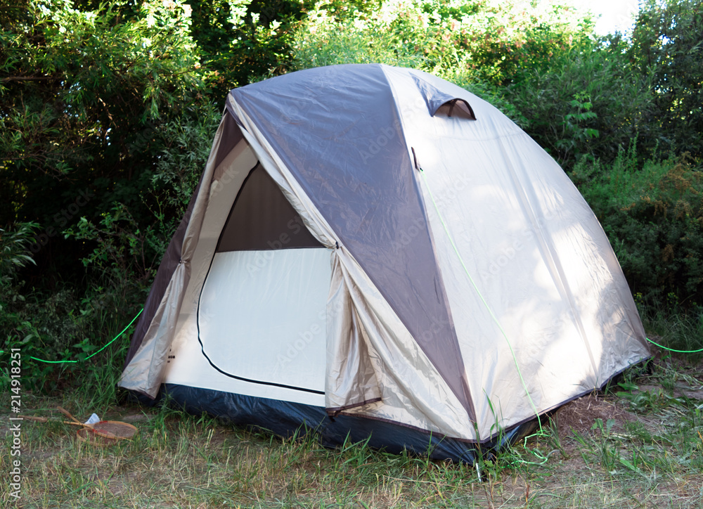 Single tent standing in the forest. Single tent standing in the forest.