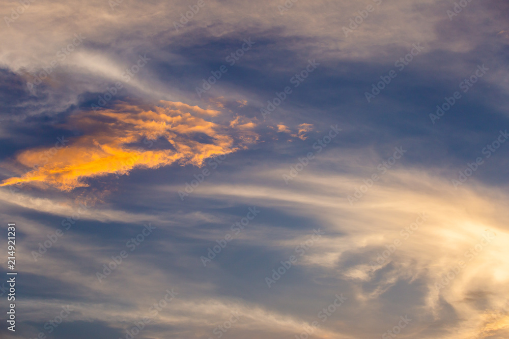 colorful dramatic sky with cloud at sunset.