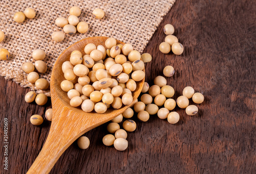 Soybean oil on a wooden background. rustic style