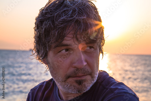 Handsome middle aged man close-up portrait / Sunset portrait