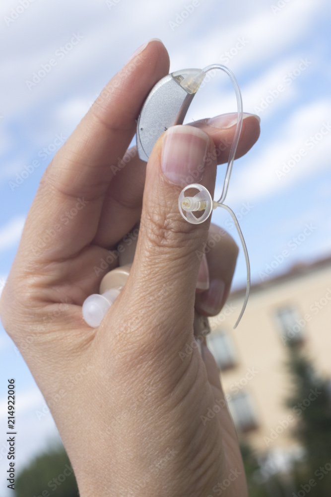 Fototapeta premium Hearing aid for deafness