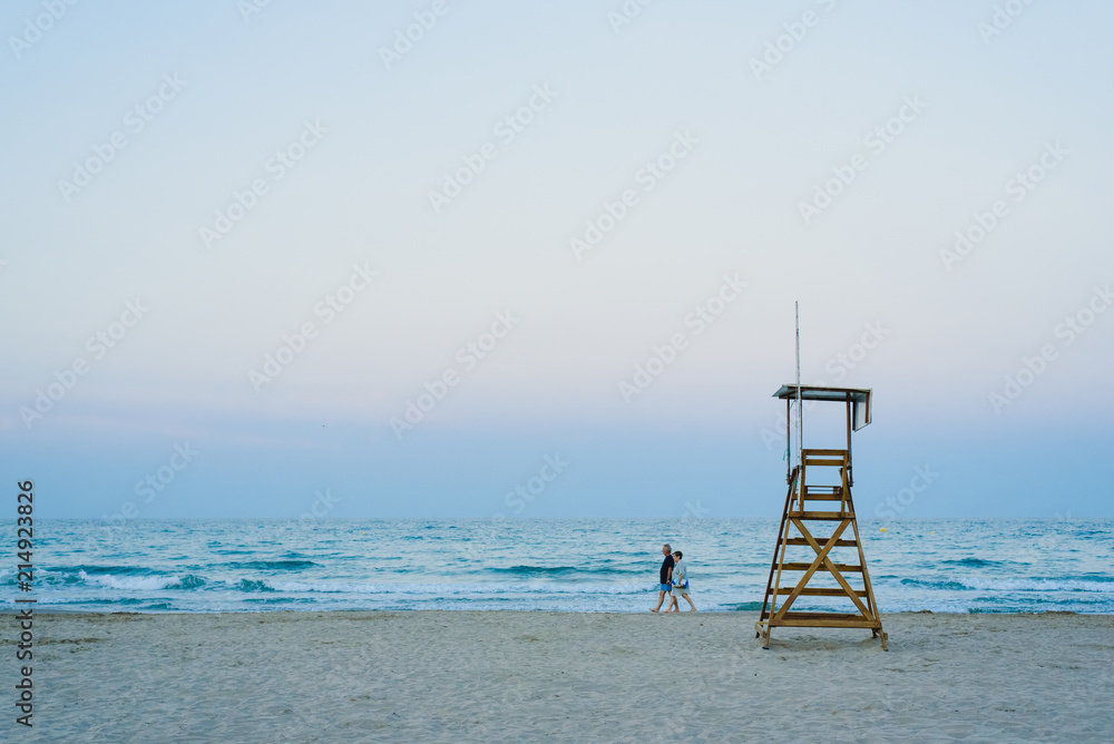 Lifeguard watchtower on the beach at sunset. Lifeguard watchtower on the beach at sunset.