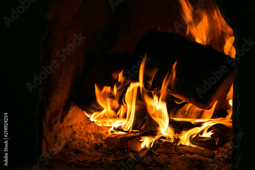 Fireplace. Burning firewood.