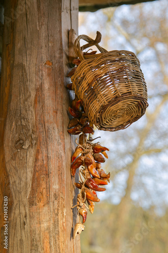 Wooden basket and red hot dried peppers