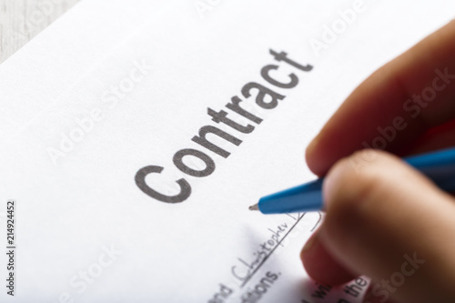 contract papers on desk
