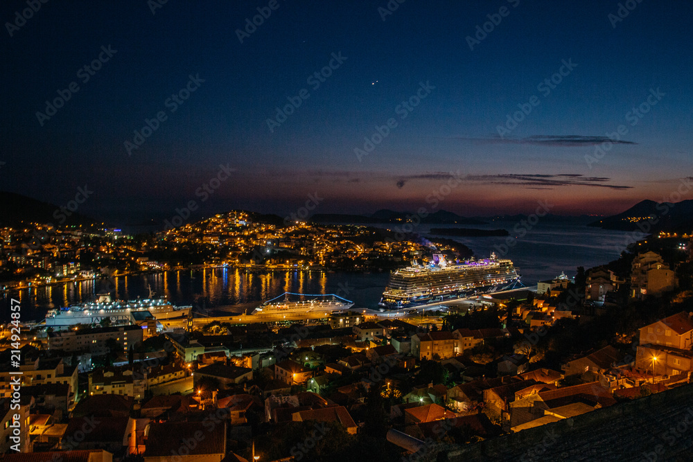 New Town city Dubrovnik view harbour with Cruise Ship at Sunset Sunrise