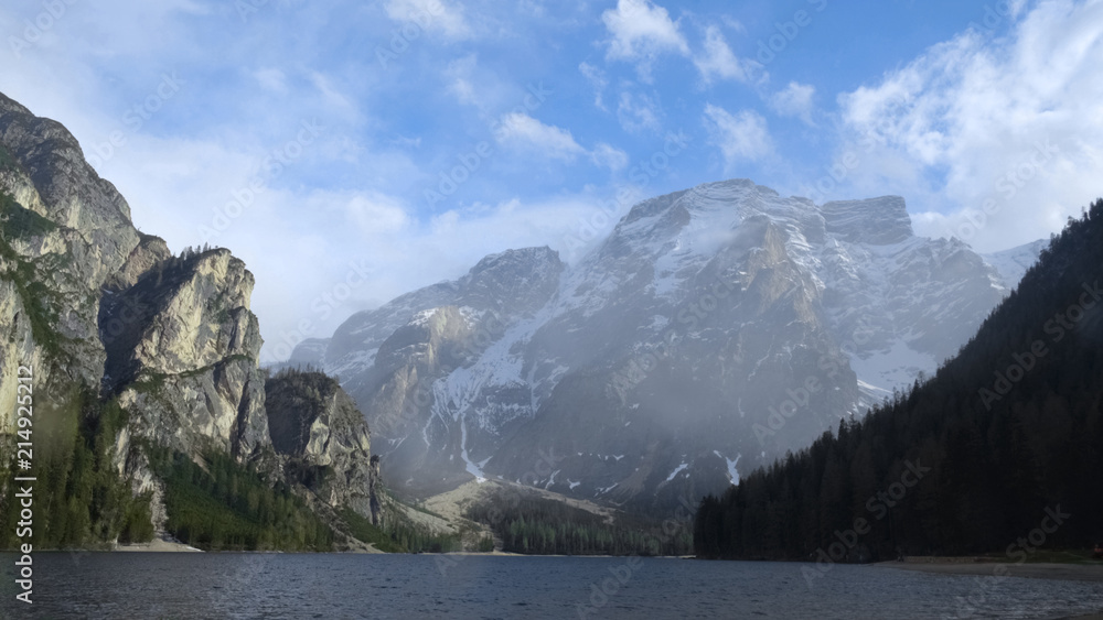 Beautiful Dolomites and mirror-loke mountain lake Braies, nature in Italy
