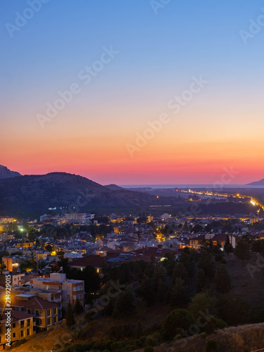 Selcuk, Turkey. View of the city and the mountains at sunset.