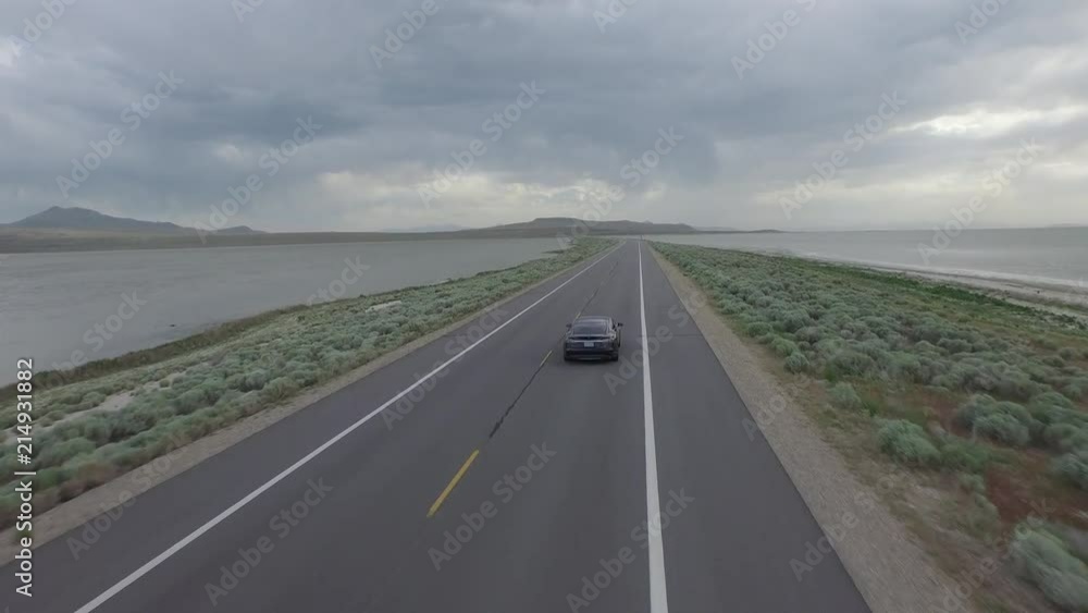 Black Car on Roadway – Follow Black Car on Roadway – Follow